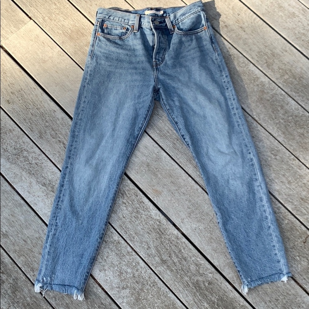 LEVI’S WEDGIE HIGH WAISTED JEANS